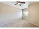 Well-lit bedroom with ceiling fan and window at 21655 N 36Th Ave # 106, Glendale, AZ 85308