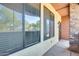 Inviting entryway with a security door and stone accents at 21655 N 36Th Ave # 106, Glendale, AZ 85308