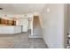 Bright entryway with stairs leading upstairs and wood-look tile floors at 21655 N 36Th Ave # 106, Glendale, AZ 85308