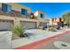 Exterior view of townhome with two-car garage at 21655 N 36Th Ave # 106, Glendale, AZ 85308