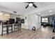 Kitchen with island, stainless steel appliances and view into living room at 225 N Standage -- # 122, Mesa, AZ 85201