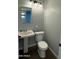 Updated bathroom with white vanity and fixtures at 236 S 2Nd St, Avondale, AZ 85323