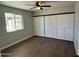 Bright bedroom with ceiling fan and large closet at 236 S 2Nd St, Avondale, AZ 85323