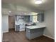 Modern kitchen with gray cabinets and white countertops at 236 S 2Nd St, Avondale, AZ 85323