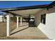 Covered patio with ceiling fan and backyard access at 236 S 2Nd St, Avondale, AZ 85323