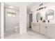 Modern bathroom with dual vanity and marble floors at 2407 E Encanto St, Mesa, AZ 85213