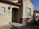 Home exterior with a walkway, landscaping, and two-car garage at 2431 N 83Rd Dr, Phoenix, AZ 85037