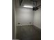 Garage with projector, ample space, and painted floor at 2431 N 83Rd Dr, Phoenix, AZ 85037