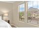 Bright bedroom featuring large windows with scenic views at 25719 N 54Th Dr, Phoenix, AZ 85083