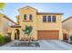 Two-story house with a large garage and well-manicured front yard at 25719 N 54Th Dr, Phoenix, AZ 85083