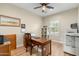 Bright home office features built-in shelving and large window at 25719 N 54Th Dr, Phoenix, AZ 85083