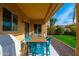 Covered patio with outdoor dining furniture at 25719 N 54Th Dr, Phoenix, AZ 85083