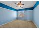 Spacious bedroom with ceiling fan and neutral decor at 29061 N Cactus Cir, San Tan Valley, AZ 85143