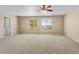 Spacious bedroom with carpet flooring and ceiling fan at 29061 N Cactus Cir, San Tan Valley, AZ 85143