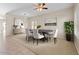 Elegant dining room features a modern table set, neutral colors, and stylish decor for comfortable entertaining at 29061 N Cactus Cir, San Tan Valley, AZ 85143