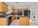 Modern kitchen with stainless steel appliances, granite countertops, and center island at 29061 N Cactus Cir, San Tan Valley, AZ 85143