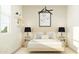 Bright bedroom with a queen bed, nightstands, and stylish decor at 29403 N 31St Ln, Phoenix, AZ 85083