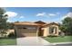 One-story home with a two-car garage and Spanish-style architecture at 29411 N 31St Ln, Phoenix, AZ 85083