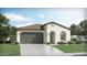 One-story house with gray garage door and landscaped front yard at 29415 N 31St Ln, Phoenix, AZ 85083