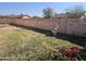 Charming backyard with a fountain and block wall at 297 Peretz Cir, Morristown, AZ 85342