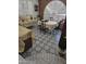 Dining area with patterned tile floor and arched window at 297 Peretz Cir, Morristown, AZ 85342