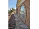 Brick home with a flagstone walkway at 297 Peretz Cir, Morristown, AZ 85342