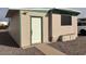 Front view of the mobile home with a walkway at 300 S Val Vista Dr # 77, Mesa, AZ 85204