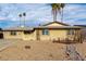 Brick single story home with a landscaped front yard and palm trees at 3808 W Mission Ln, Phoenix, AZ 85051