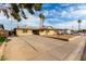 Single story home with a long driveway and street view at 3808 W Mission Ln, Phoenix, AZ 85051