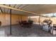 Covered patio with seating area and built-in grill at 3808 W Mission Ln, Phoenix, AZ 85051