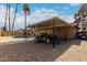 Relaxing backyard with a refreshing pool and covered patio at 3808 W Mission Ln, Phoenix, AZ 85051