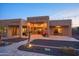 Backyard with patio, string lights and sliding doors to interior at 39005 N 11Th Ave, Phoenix, AZ 85086