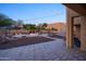 Backyard patio with a fire pit and built-in seating at 39005 N 11Th Ave, Phoenix, AZ 85086