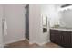 Bathroom with double sinks and a walk-in shower at 39005 N 11Th Ave, Phoenix, AZ 85086