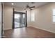 Spacious bedroom with wood floors and sliding glass doors at 39005 N 11Th Ave, Phoenix, AZ 85086