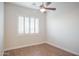 Bright bedroom with wood floors and sliding glass doors at 39005 N 11Th Ave, Phoenix, AZ 85086