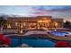 Stunning desert home with pool and spa at dusk at 39005 N 11Th Ave, Phoenix, AZ 85086