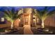 Elegant entryway with stone columns and palm trees at 39005 N 11Th Ave, Phoenix, AZ 85086