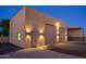 Detached workshop with double garage doors and lighting at 39005 N 11Th Ave, Phoenix, AZ 85086