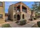 Front view of the townhome with walkway and landscaping at 3935 E Rough Rider Rd # 1076, Phoenix, AZ 85050