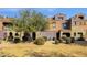 Townhouse with landscaping and a grassy area at 3935 E Rough Rider Rd # 1076, Phoenix, AZ 85050