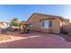 Backyard with patio, shade sail, and view of house at 3946 E Pollack St, Phoenix, AZ 85042