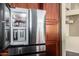 Stainless steel refrigerator with beverage dispenser at 3946 E Pollack St, Phoenix, AZ 85042