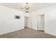 Simple bedroom with neutral walls, carpet, and ample closet space at 4026 E Madre Del Oro Dr, Cave Creek, AZ 85331