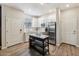 Modern kitchen with white cabinets, stainless steel appliances and island at 4026 E Madre Del Oro Dr, Cave Creek, AZ 85331