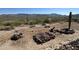 Large backyard with desert landscaping and rock formations at 45239 N 16Th St, New River, AZ 85087