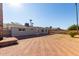 View of the home's back and the backyard with patio at 4538 W Sierra St, Glendale, AZ 85304