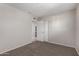 Bedroom with door to hallway and closet at 4538 W Sierra St, Glendale, AZ 85304