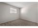 Bedroom with window and neutral walls at 4538 W Sierra St, Glendale, AZ 85304