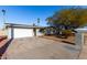 Front view of a single story home with a driveway at 4538 W Sierra St, Glendale, AZ 85304